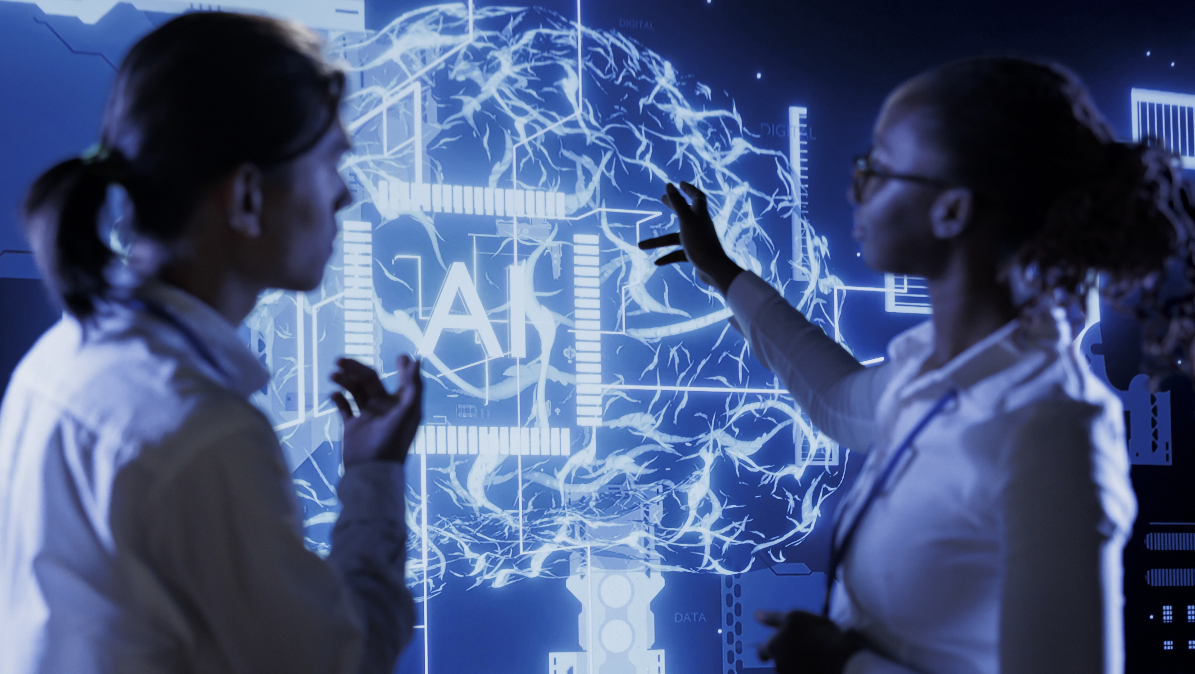 Knowledgeable professionals looking at hologram of artificial intelligence human brain simulation