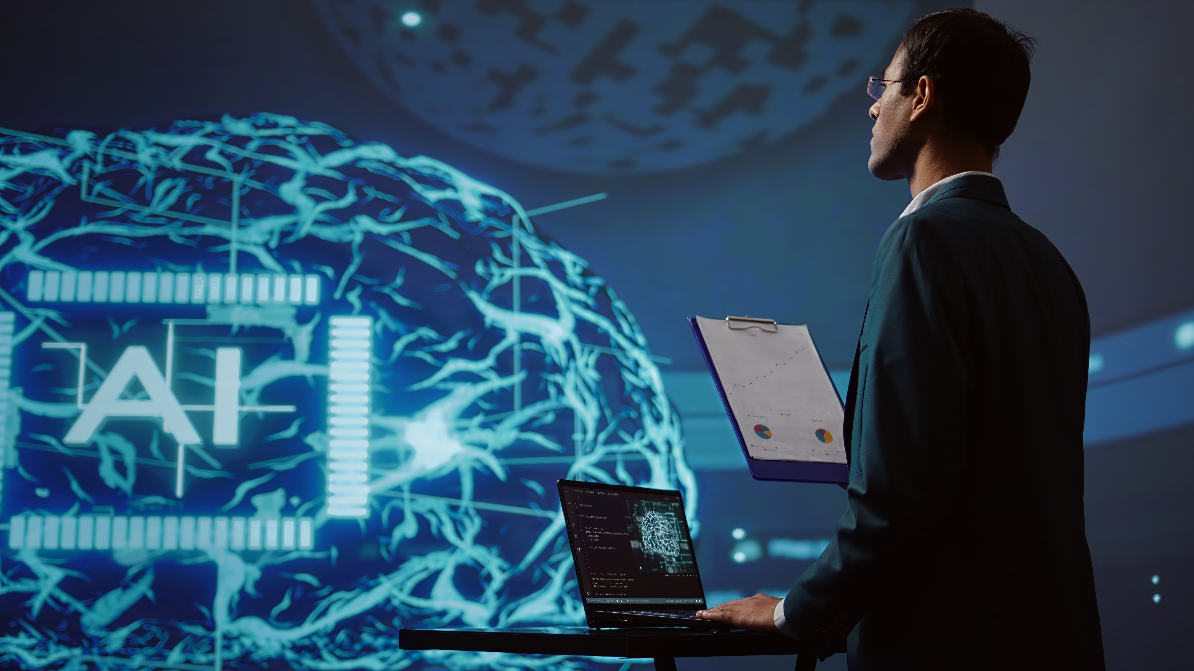 Startup employee looking over business charts using ai software